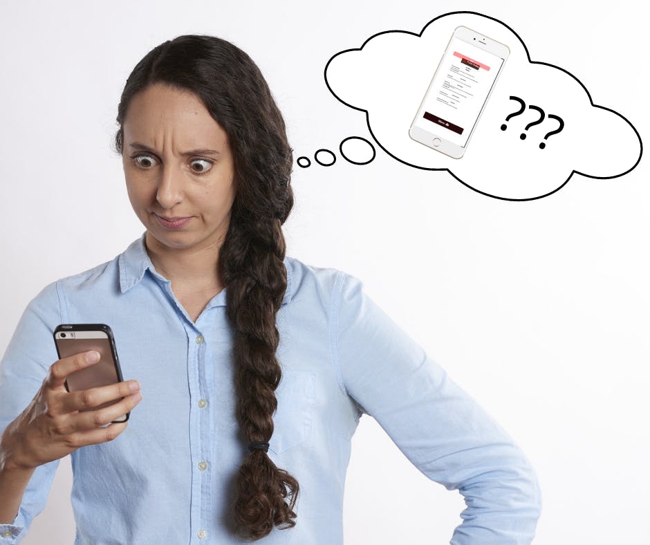 Woman With Phone Looking At Menu