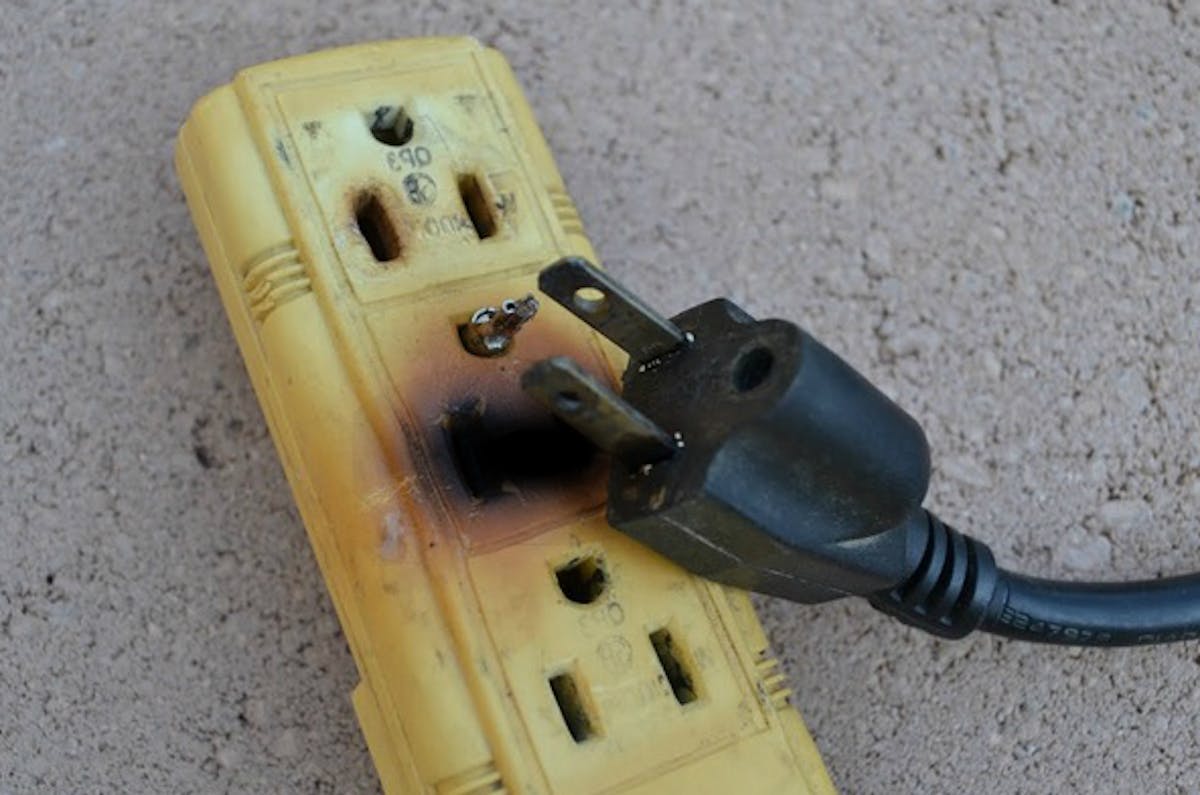 What are warning signs of electrical problems in the home?