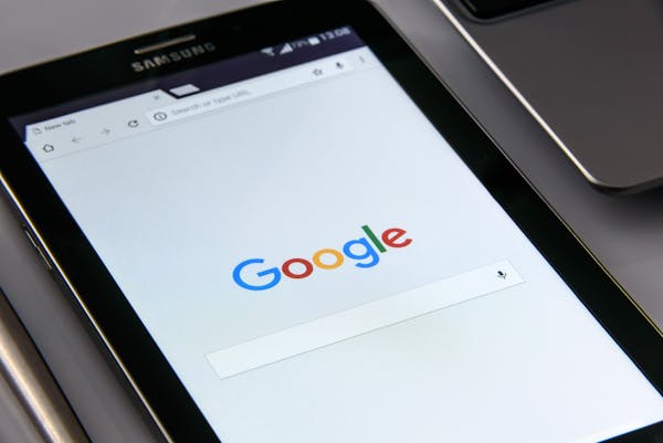 Image Of Googler Search On A Smartphone