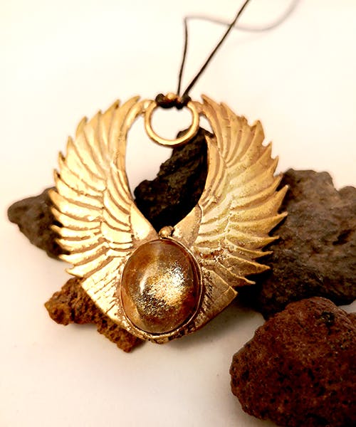 Ciondolo in bronzo con pietra del sole