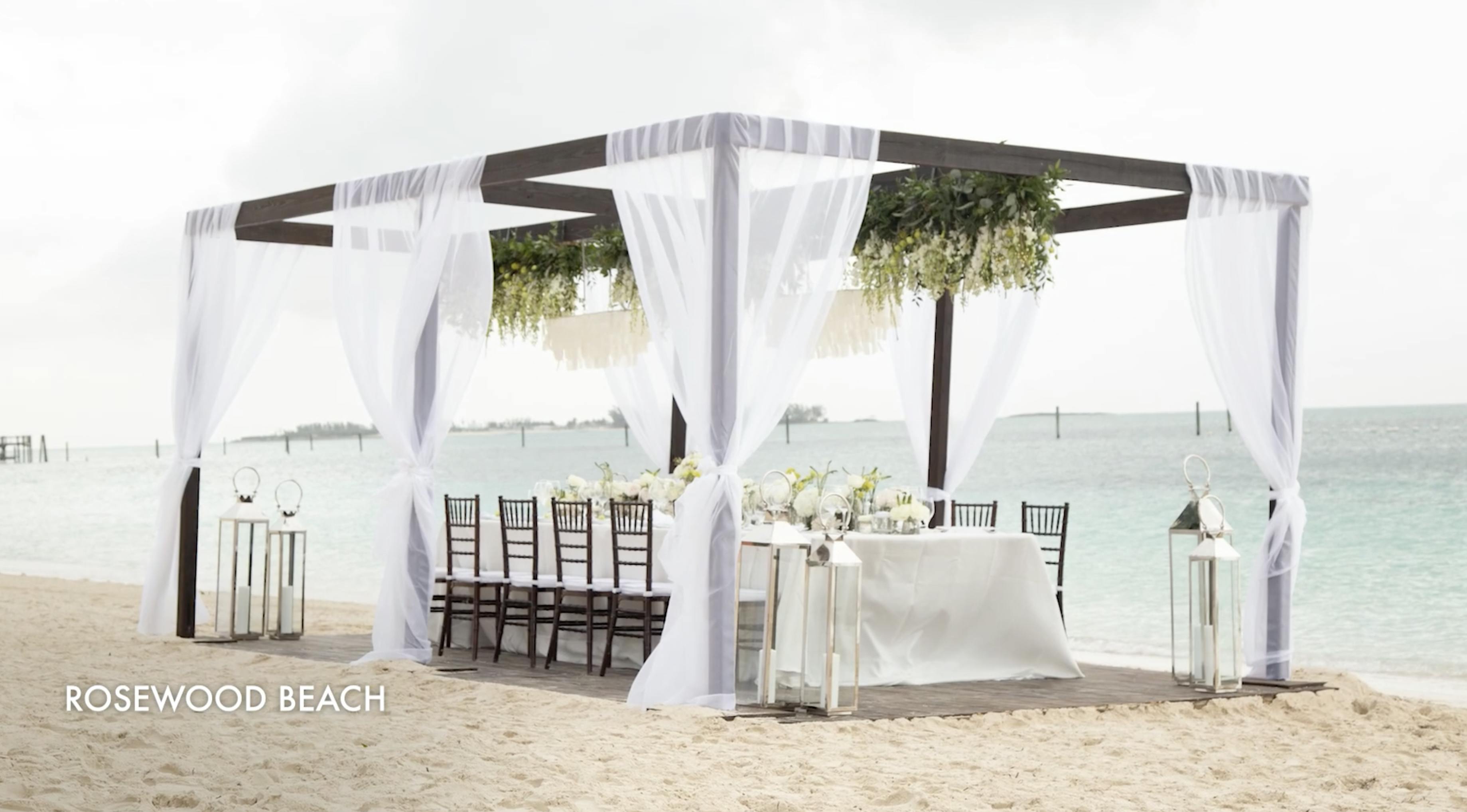 Rosewood Baha Mar luxury wedding venue with elegant beachfront ceremony setup and ocean views