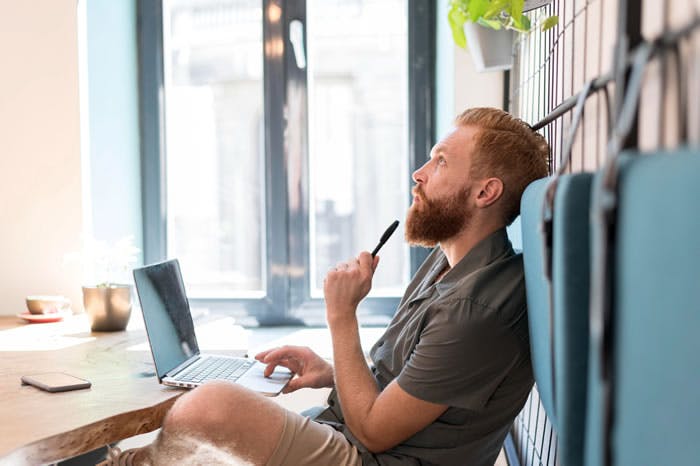 Man thinking about a side hustle