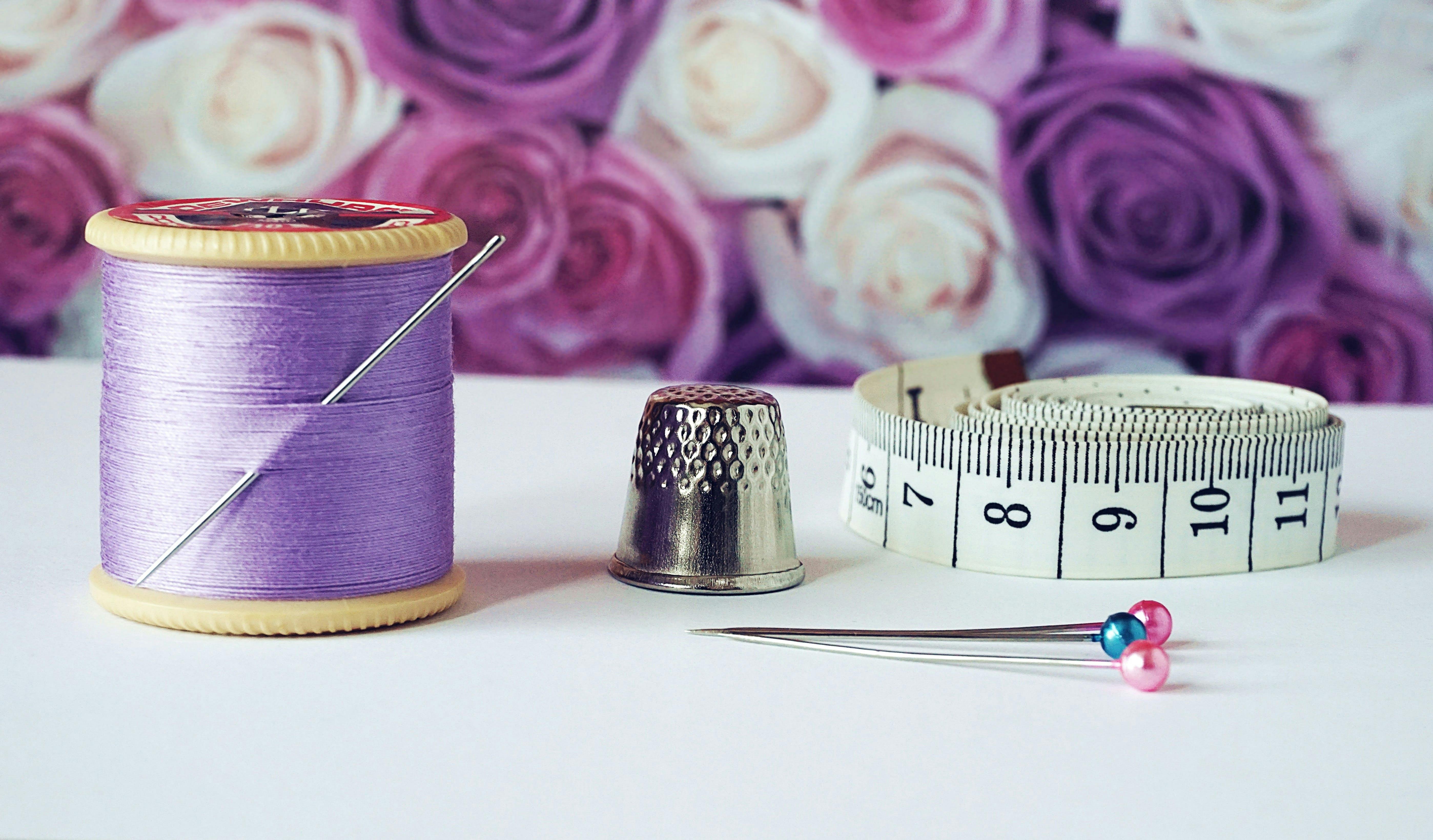 Image Of Needle, Thread, Pins, Measuring Tape and Thimble