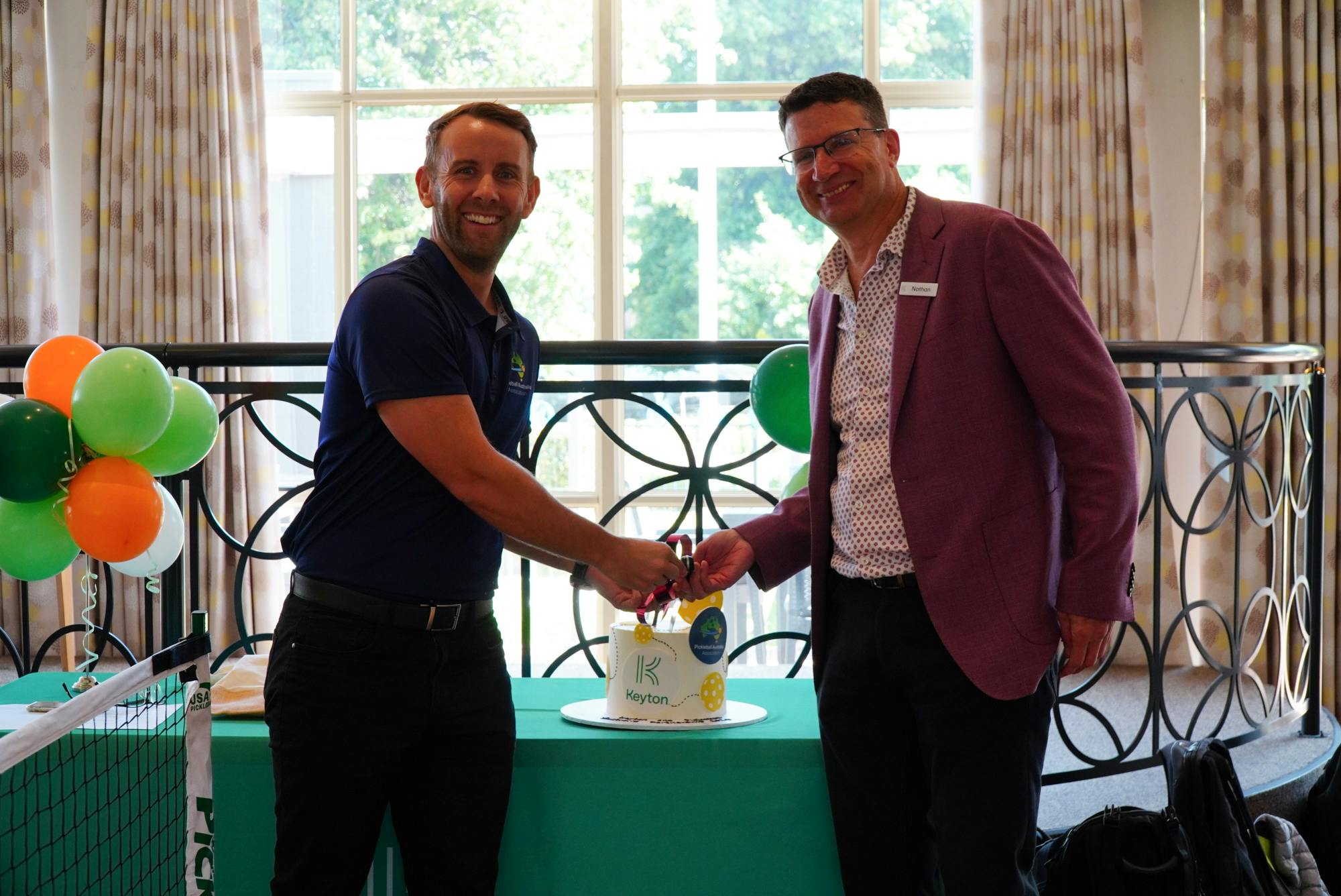 Executive Officer | Pickleball Australia, Brendan Lee and Nathan Cockerill, CEO | Keyton formalise the partnership with the cutting of the cake.