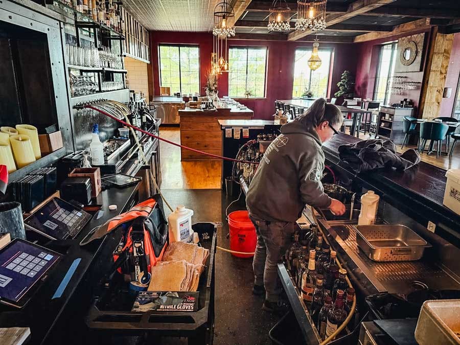 TopShot technician on-site installs a commercial ventilation system on the rooftop a professional kitchen.